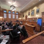 Jason Ronis standing in front of the San Diego courthouse, representing the firm's track record for criminal case dismissals.