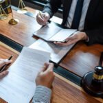 A San Diego drug defense attorney offering a free, confidential legal case review to a client.