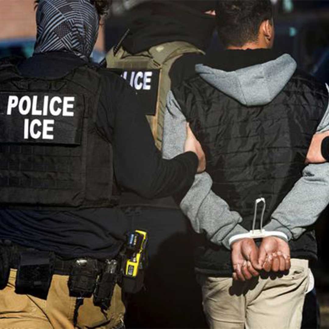 Hands holding immigrant rights card San Diego legal defense.