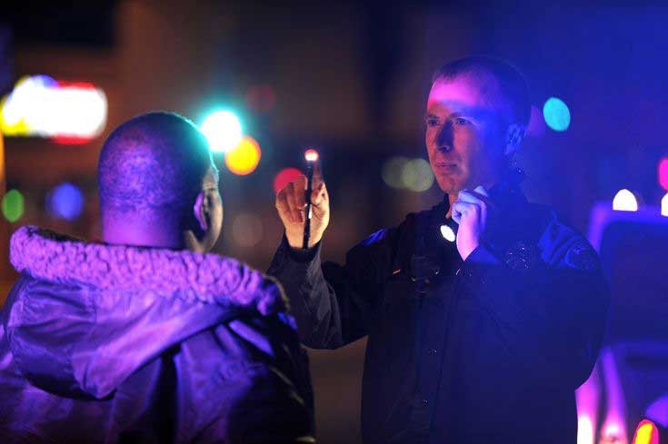 San Diego DUI traffic Stop, officer pulling over and citizen suspected of DUI in San Diego CA